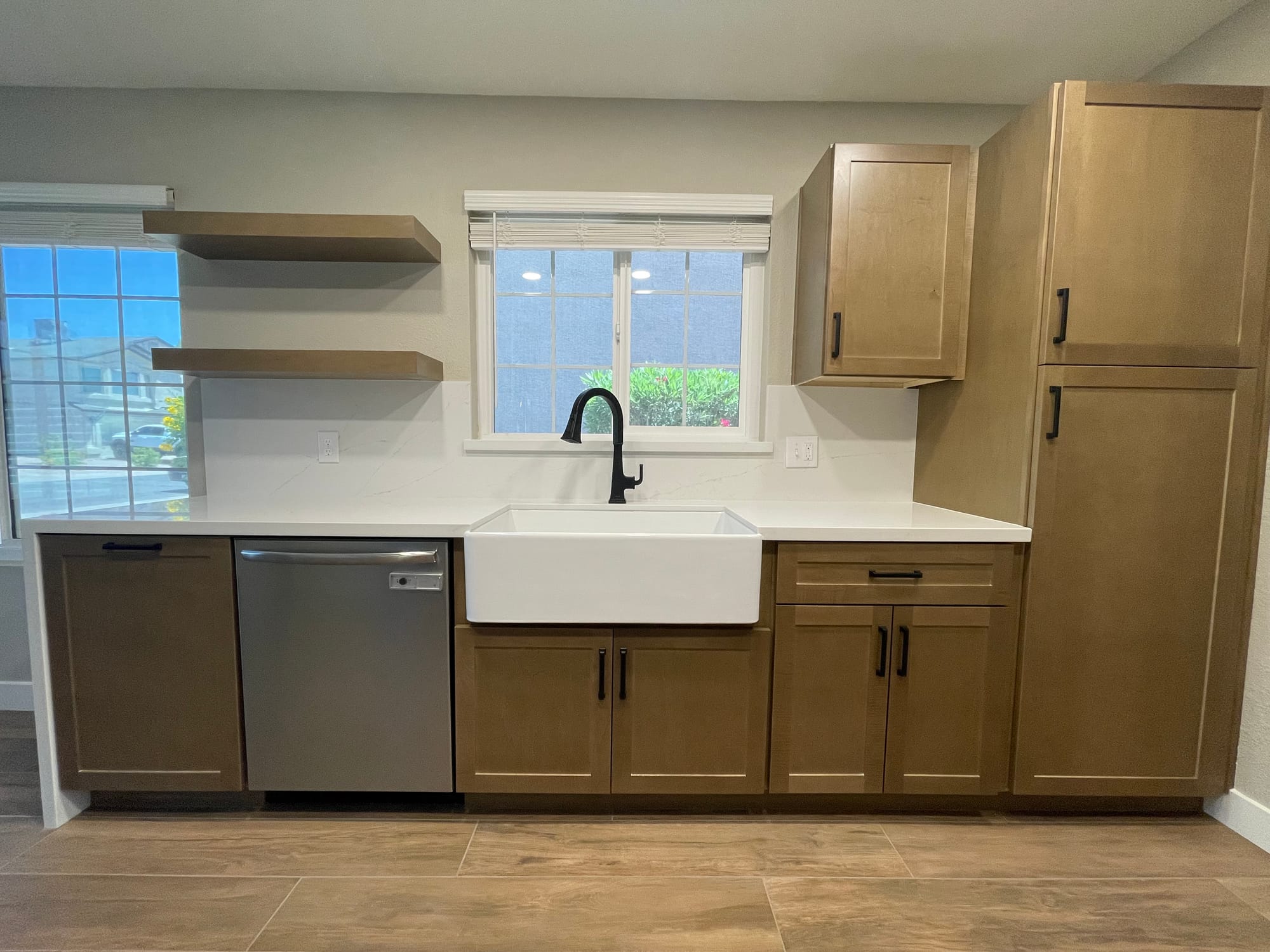 Chandler farmhouse kitchen — Della Terra quartz waterfall countertop