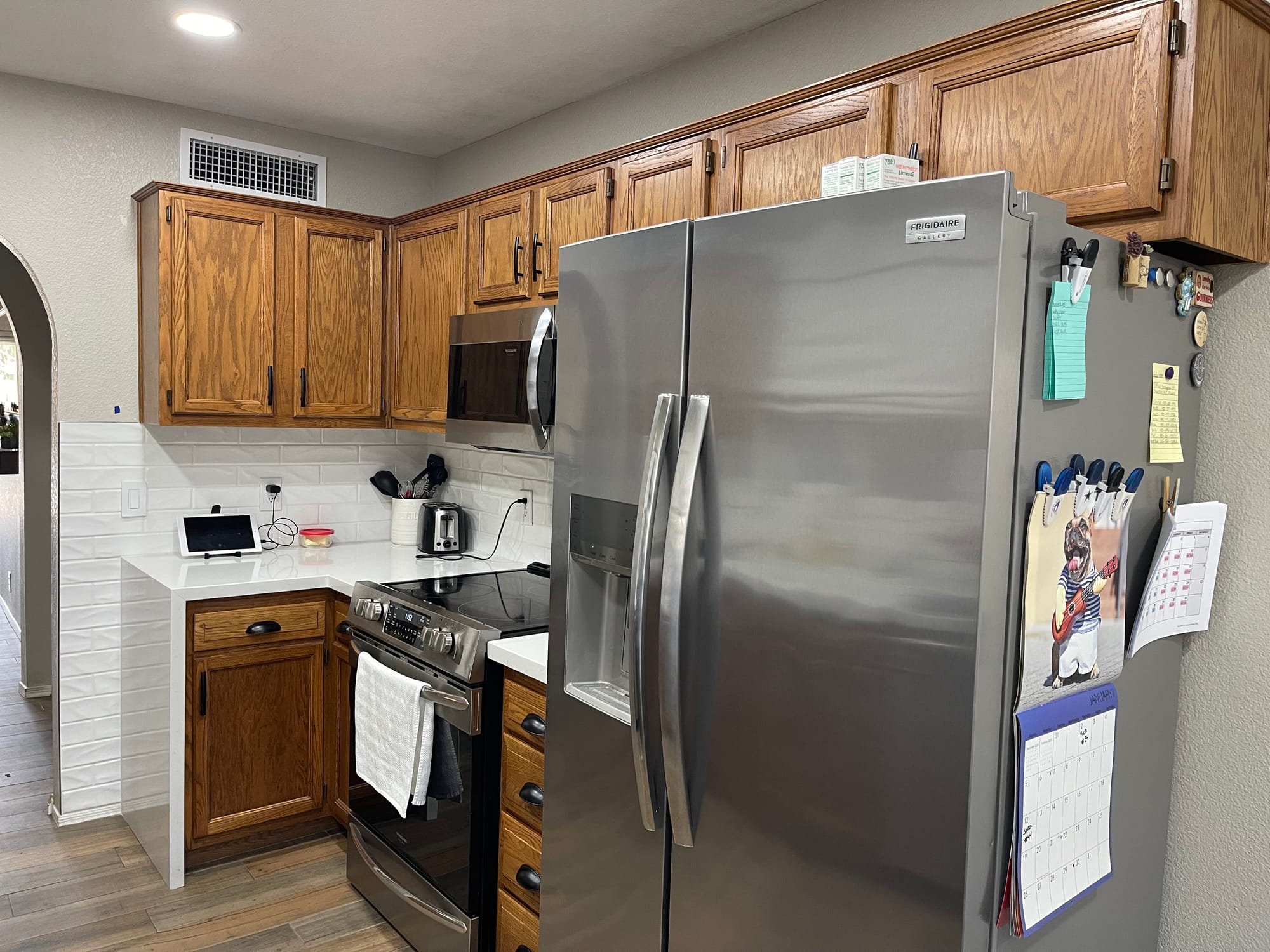 Chandler kitchen before — dated countertops and backsplash