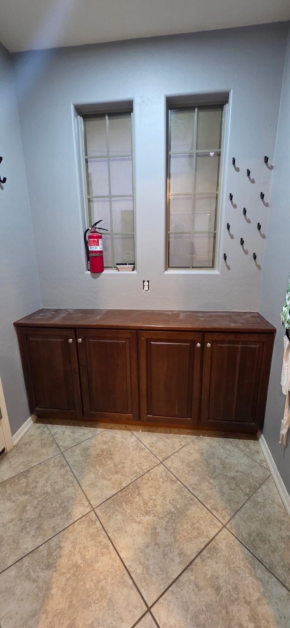 Gilbert kitchen before — dated dark cherry cabinets in the side utility area