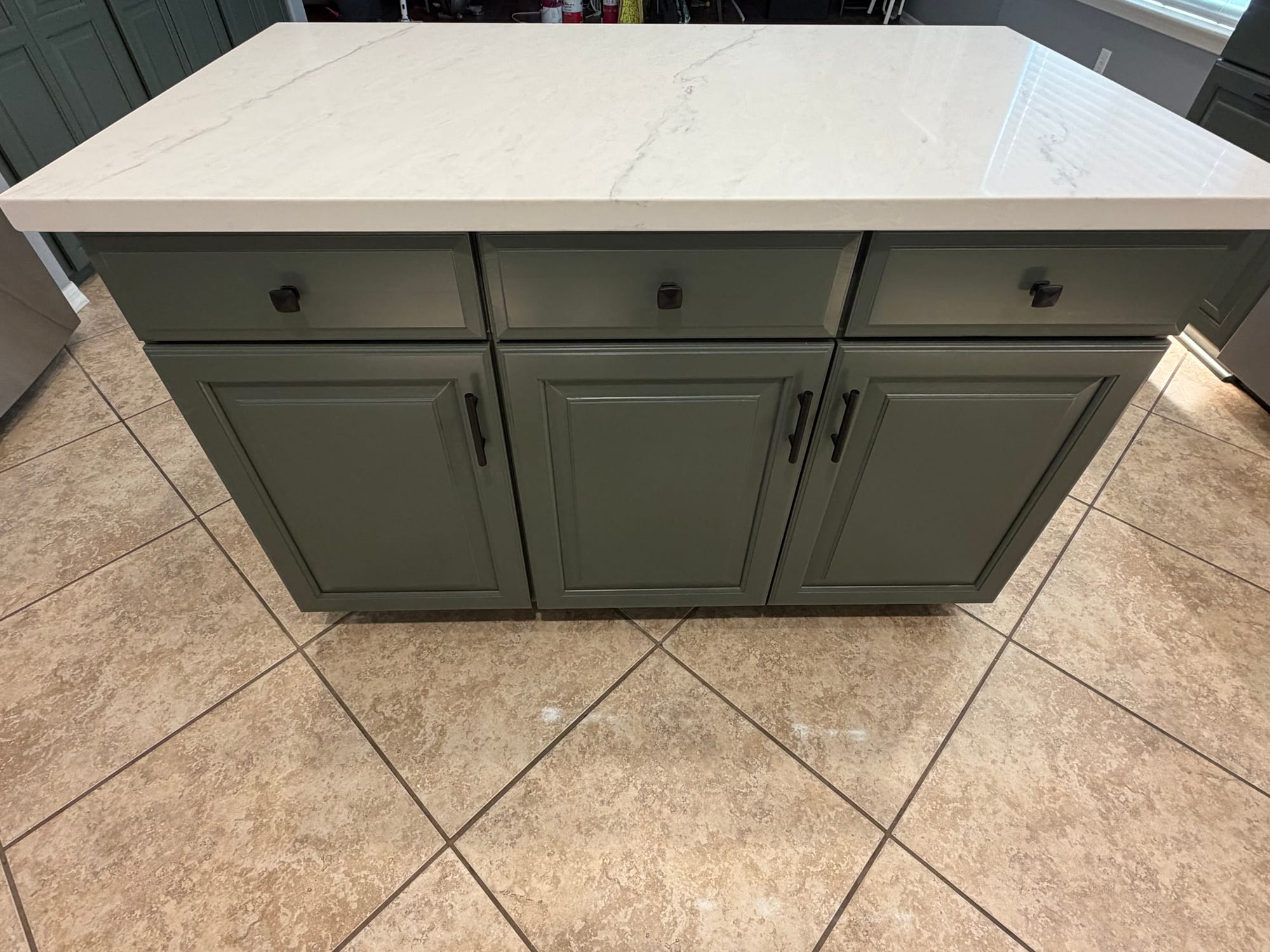 Gilbert kitchen — small prep cabinet with sage cabinetry and white Della Terra quartz top