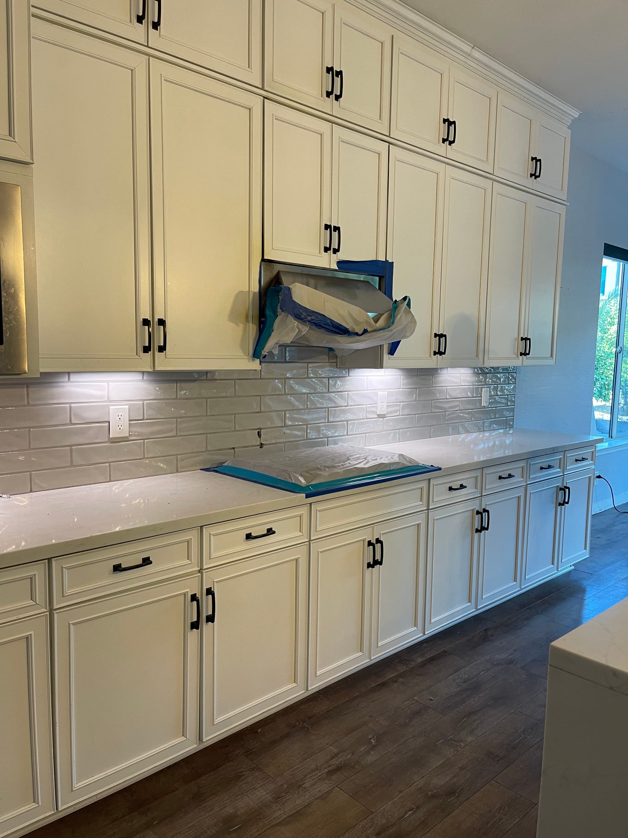 Mesa kitchen before — fire and water damage, destroyed cabinets and flooring