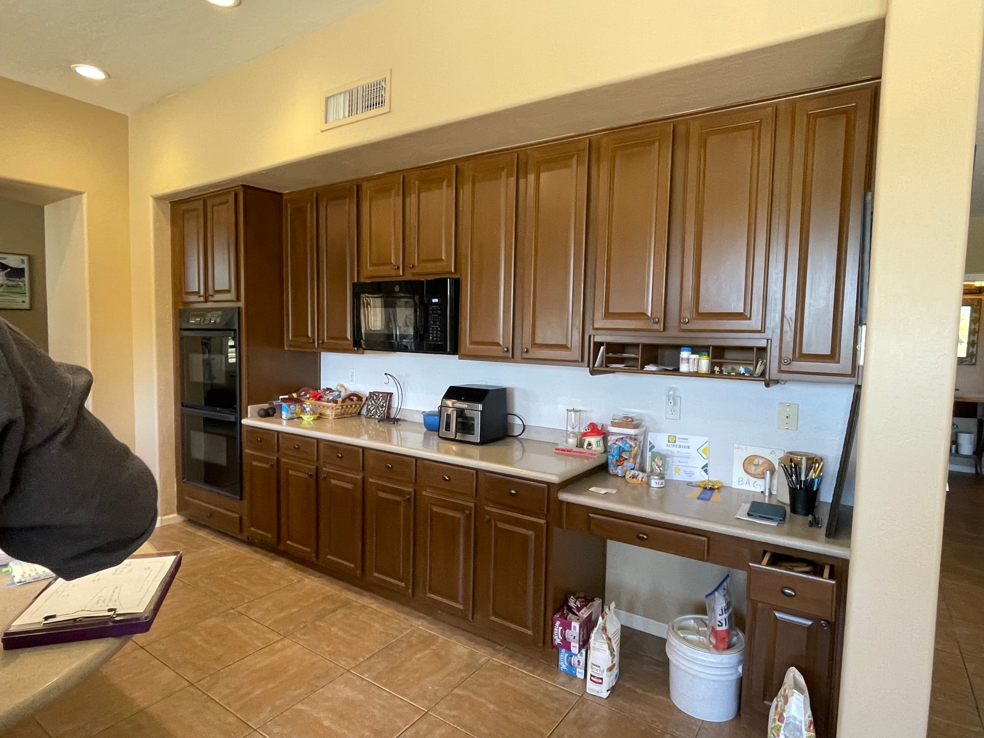 Scottsdale kitchen before remodel — dated oak cabinets and beige granite